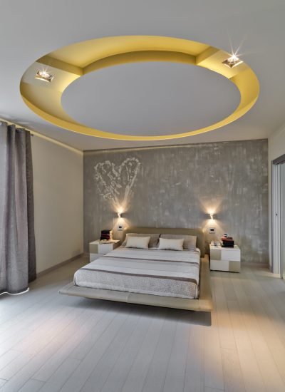 interiors shots of a modern bedomm with wooden flooring